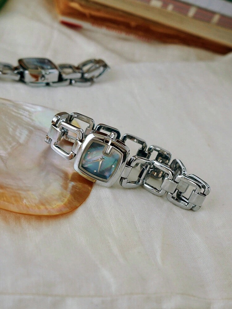 1pc Elegant & Women's Quartz Watch Silver-Tone Stainless Steel Strap, Rhinestone Decor, Mother-of-Pearl Dial