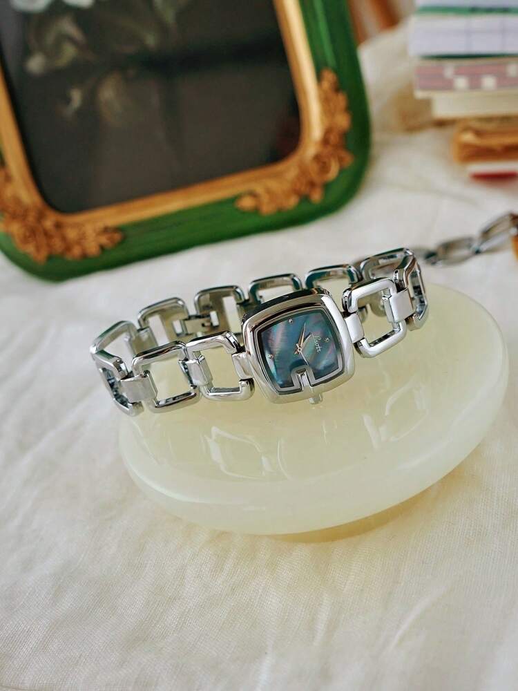 1pc Elegant & Women's Quartz Watch Silver-Tone Stainless Steel Strap, Rhinestone Decor, Mother-of-Pearl Dial