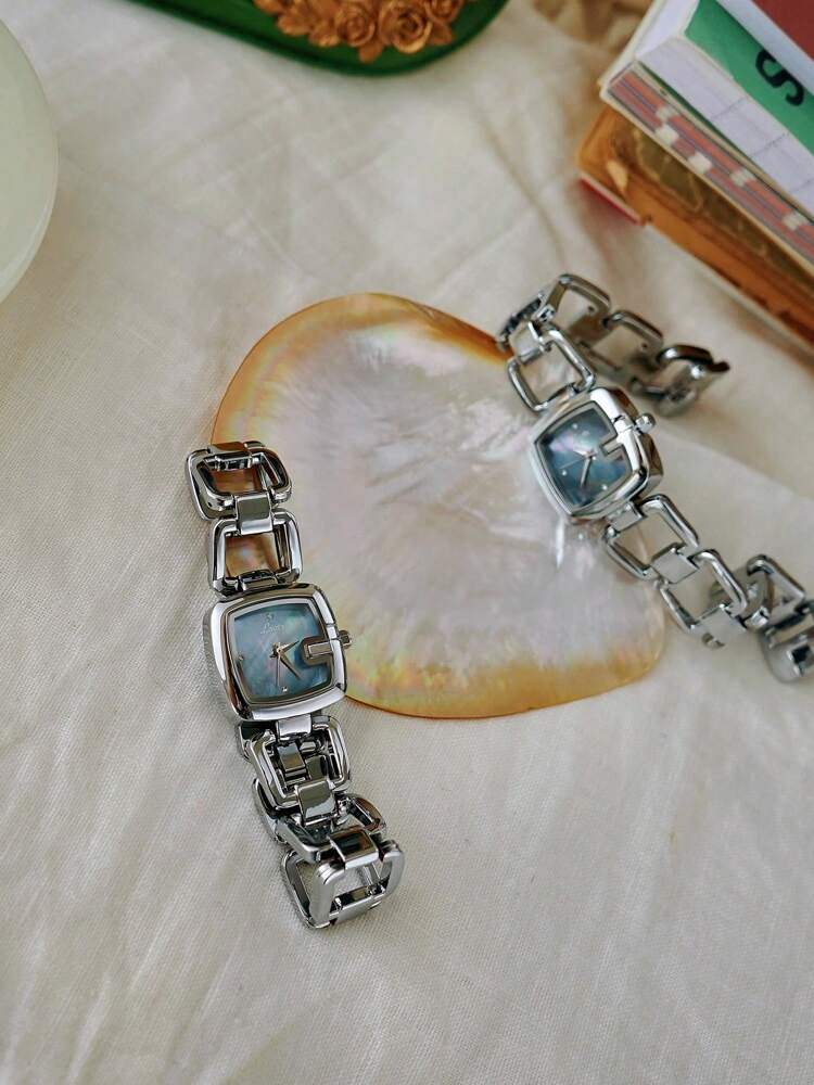 1pc Elegant & Women's Quartz Watch Silver-Tone Stainless Steel Strap, Rhinestone Decor, Mother-of-Pearl Dial
